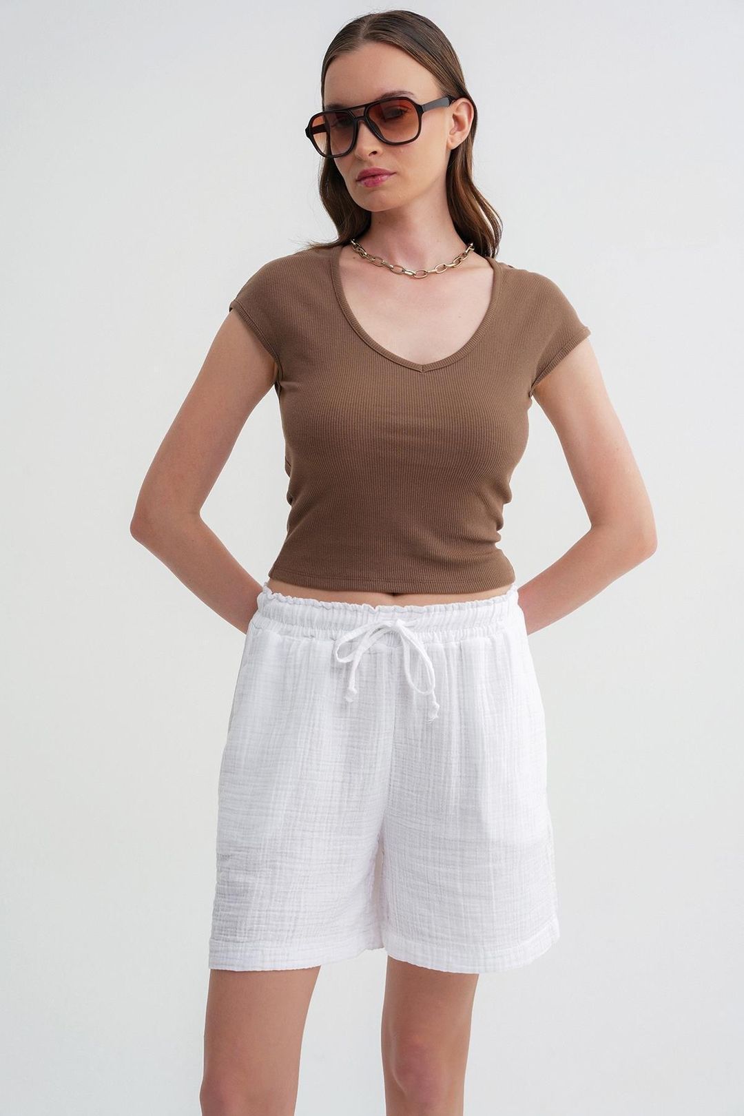 Högmidjade texturerade bomullsshorts